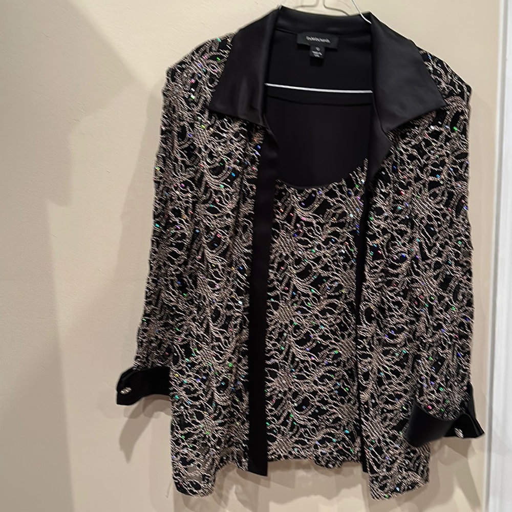 Glamorous black blouse with gold stitching and sequins